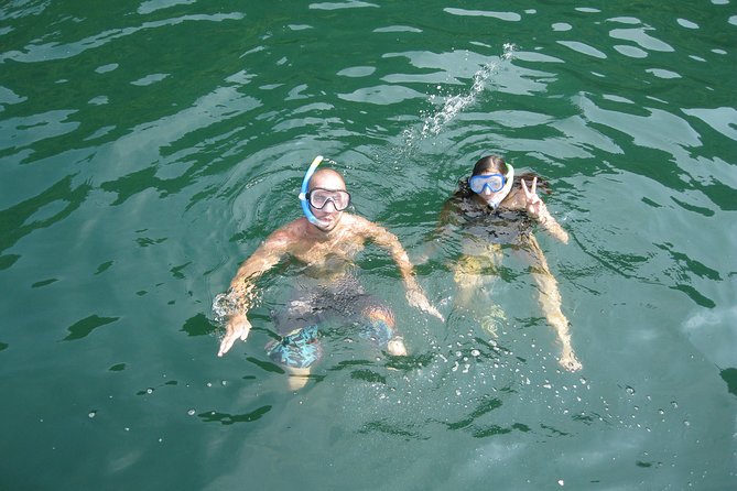 1 Day Boat Tour: HaLong Bay, Lan Ha Bay, Natural Beach and Full Moon Party - Kayaking through Bright Cave and Dark Cave