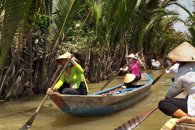 1-Day Mekong Delta Deluxe Tour: My Tho & Ben Tre (Max 10) - A narrow canal by rowing boat