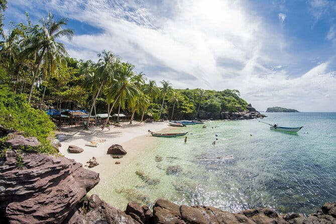 17-Day Vietnam Tour | Explore the Best Highlights of Vietnam - Hoi An pairs coconut boats with old trading streets