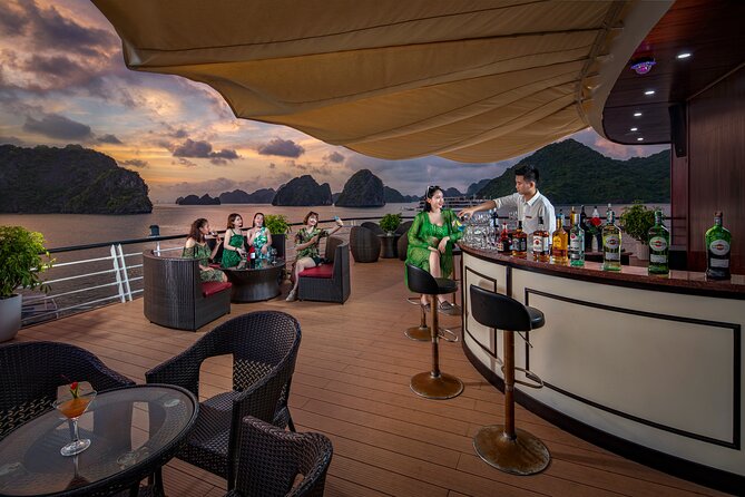 2-Day Luxury Halong Bay Aspira Cruise from Hanoi - Sunset, cooking, and evening entertainment