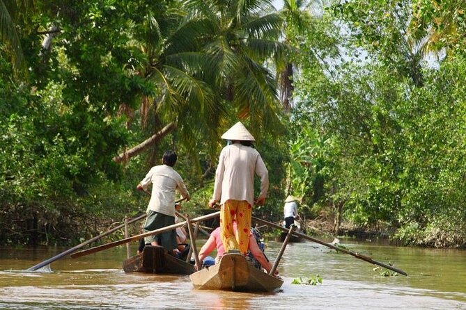 Adventure Cu Chi Tunnels and Mekong Delta Tour From HCM - Entering the Cu Chi Tunnels
