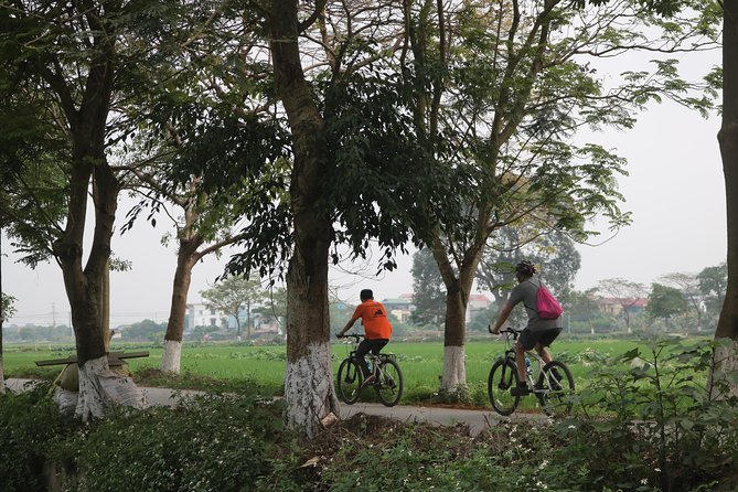 Bicycle Tour Full Day Explore Red River Delta & Rural Villages - Long Bien Bridge and the first serious traffic