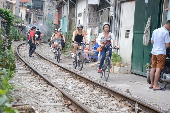 Bicycle Tours Hanoi: Half Day Hanoi City Bicycle Tours - Crossing Long Bien Bridge over the Red River