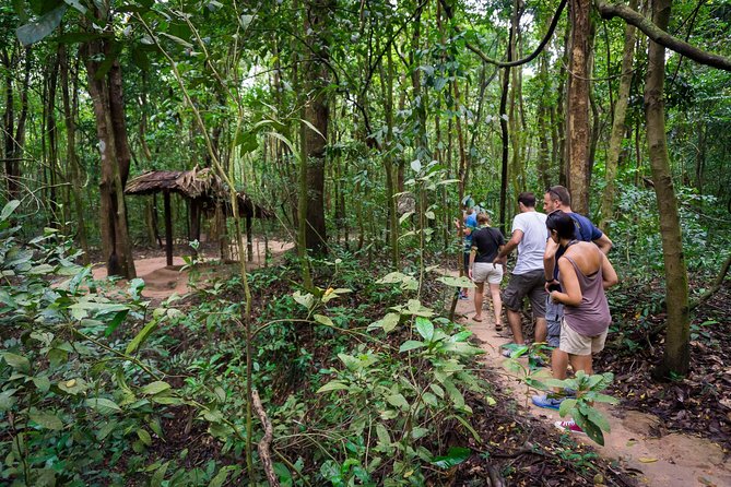 Cu Chi Tunnels and Mekong Delta 1 Day Tour With Small Group - Coconut candy, orchards, and the smaller canal boat