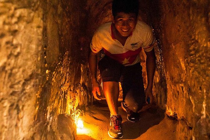 Cu Chi Tunnels Half Day - Small Group - Entering the Cu Chi Tunnel complex