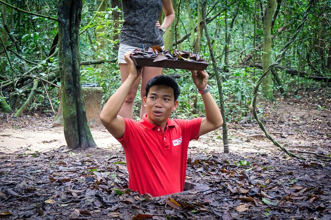 Cu Chi Tunnels Half-Day Tour: Big Group Vietnam War Experience - What the tunnel section feels like