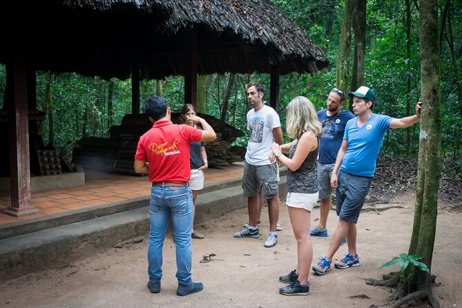 Cu Chi Tunnels Half-Day Tour: Big Group Vietnam War Experience - Inside the Ben Duoc tunnel complex