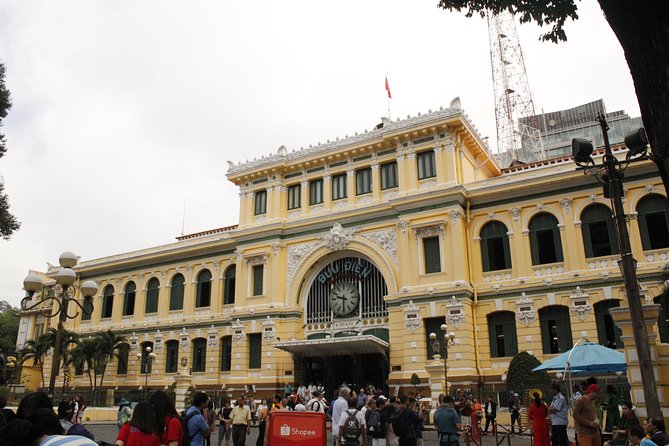 Cu Chi Tunnels - Tapioca & City Tour (6 Major Attractions) 1 day - Entering the Cu Chi Tunnels