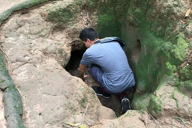 Cu Chi Tunnels tour In The Morning by DGT - Crawling through the narrow tunnels