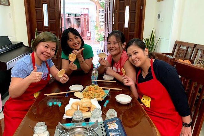 Da Nang Authentic Home Cooking Class - Finishing the dishes and sitting down together