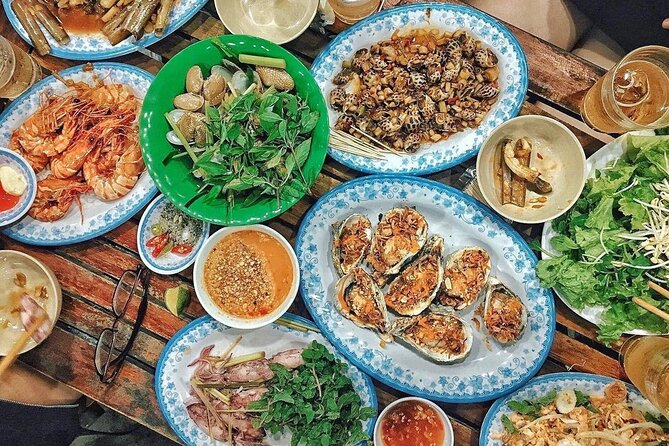 Da Nang By Night: Seafood dinner, night market and cruise trip - Dragon Bridge, Han Bridge, Love Bridge, and DHC Marina