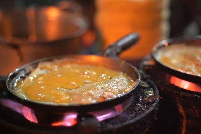 Da Nang Evening Food Tour - Rice cakes and small dishes at the first stops
