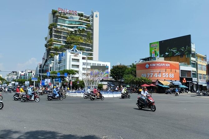 Da Nang Food Tour Motorbike & Sightseeing By Ao Dai Lady Rider - APEC Park and the riverfront city center