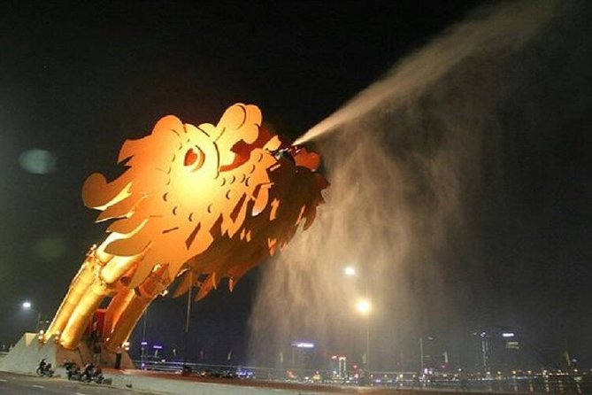 Da Nang Night Motorbike Tour & River Cruise Riding By Lady Rider - Dragon Bridge when the lights come on