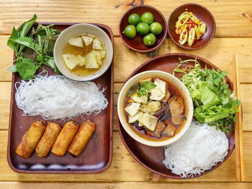 Dalat: Home Cooking Class with Central Market Tour - Eating what you prepared in the garden