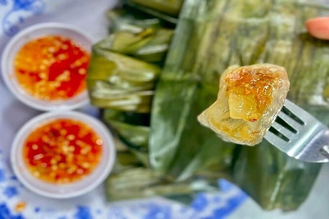 DaNang Night Foodie Tour-Sighseeing with Aodai Lady Rider Private - The amusement park and pagoda question