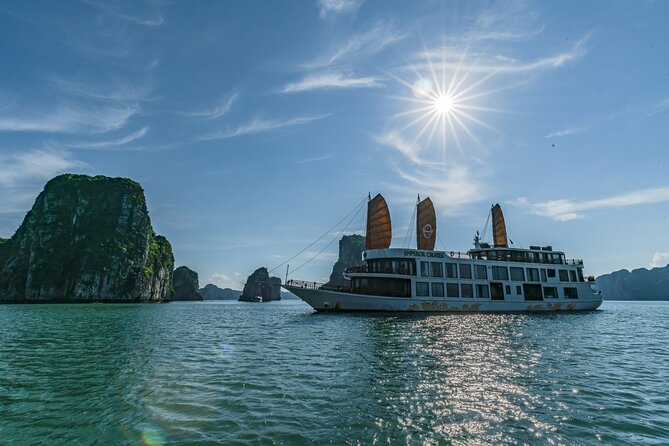 Emperor Cruises Experience 2 Days 1 Night in Halong Bay. - Lunch, cabins, and the first view of Halong Bay