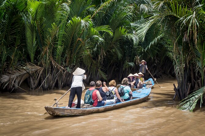 Essential Mekong Delta: Highlights Tour from Ho Chi Minh City - Tan Thach canal by traditional sampan
