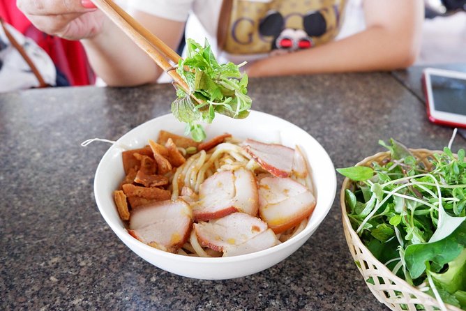 Evening Walking Food Tour, folk game and lantern boat - A 15-minute boat ride and floating lantern