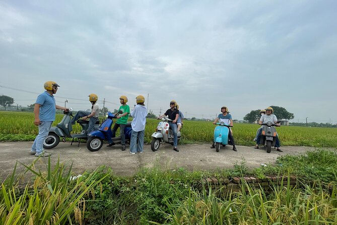Exploring Vespa Tour Through Little Red River Delta - Crossing Long Biên Bridge by Vespa