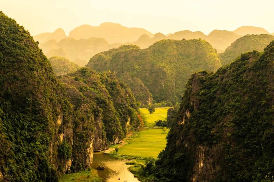 From Hanoi: 2-Day Ninh Binh Tour with Accommodation & Meals - Cycling through rice paddies near Tam Coc