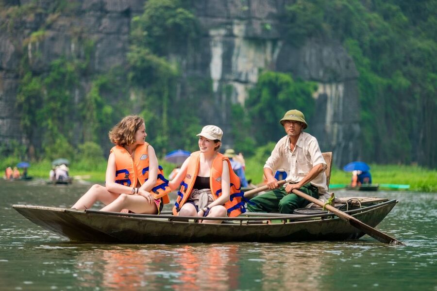 From Hanoi: Hoa Lu & Tam Coc with Buffet lunch & Cycling - Tam Coc by sampan, with caves and limestone cliffs