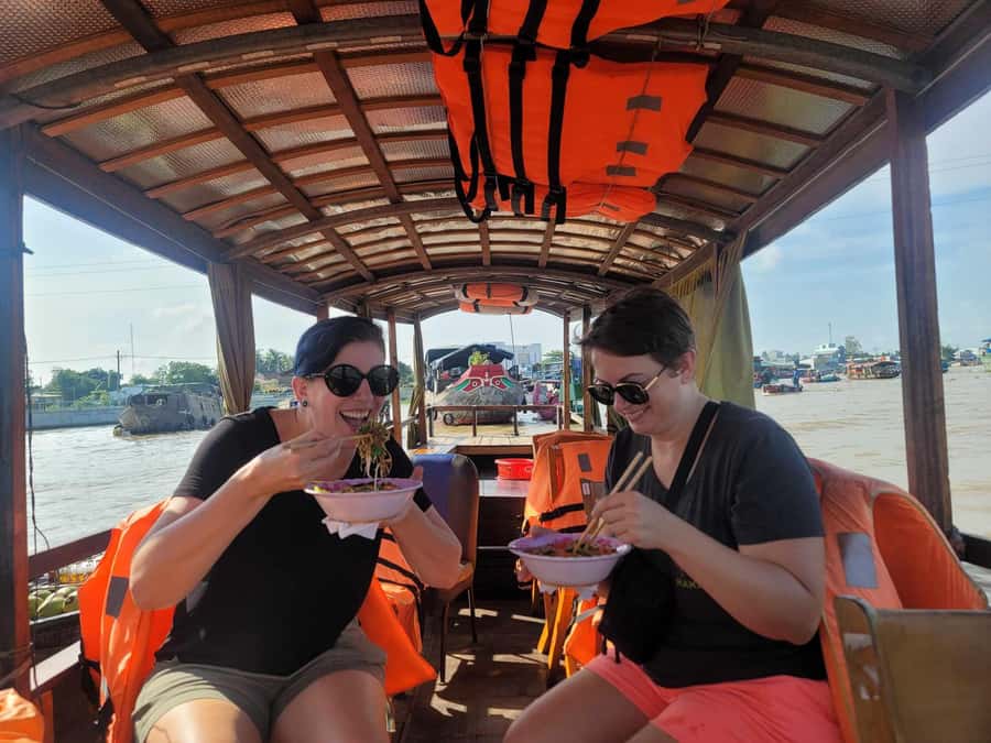 From HCM: Mekong Delta & Cai Rang Floating Market 2-Day Tour - Village stops, fruit, honey tea, and local music