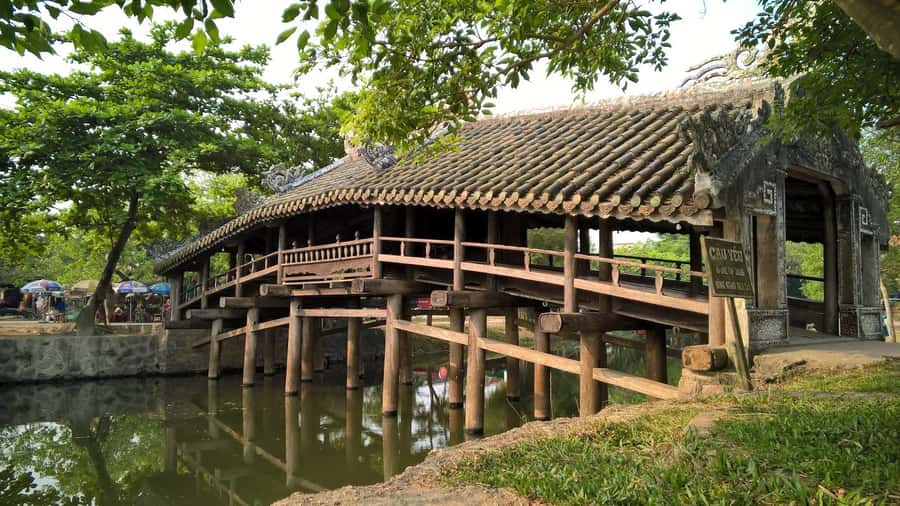 From Hue: Hoi An Guided Bus Tour with 4 Scenic Stops - Marble Mountains: caves, pagodas, and a short climb