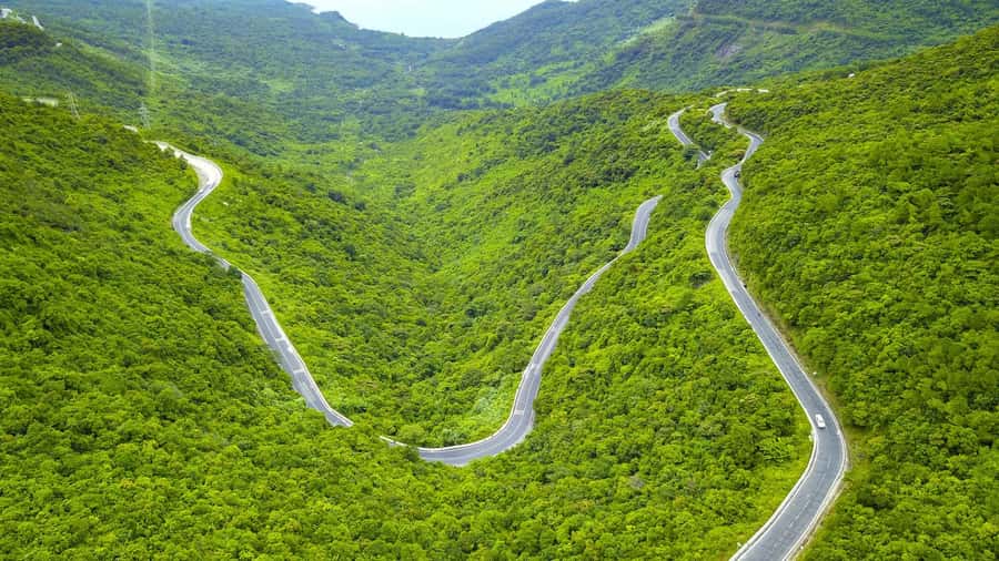 From Hue: Hoi An Guided Bus Tour with 4 Sightseeing Stops - Marble Mountains and the Final Walk
