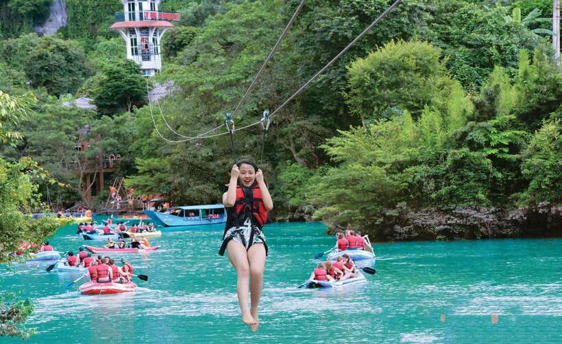 From Phong Nha/DongHoi: Paradise Cave and Zipline Dark Cave - Paradise Cave begins with a jungle ride and a climb