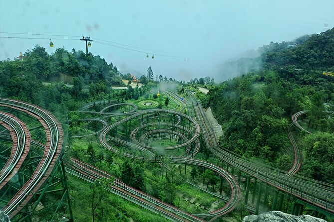 Golden Hand Bridge And Ba Na Hills tour from Hoi An/ Da Nang - Walking across the Golden Hand Bridge