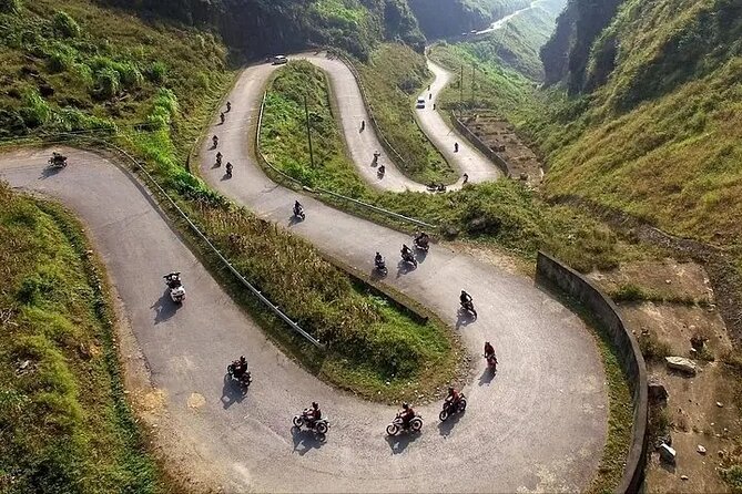 Ha Giang Loop 3 days and 2 nights Motorbike Tour with Easy rider - Day 2: Tham Ma Pass, the H’mong King Palace, and Lung Cu
