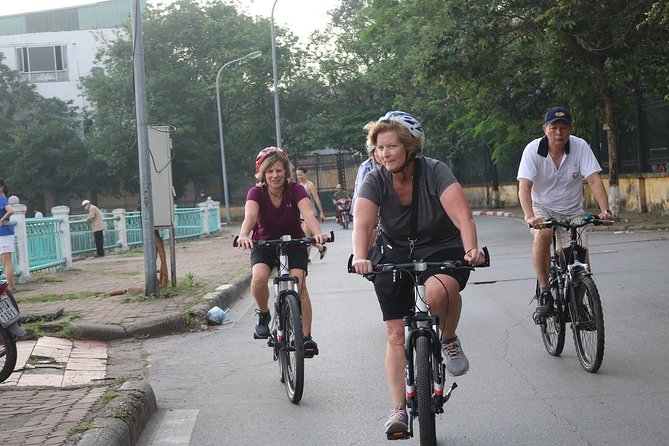 Half-Day Bicycle Tour Combine City & Countryside + Train Street - West Lake for a change of pace