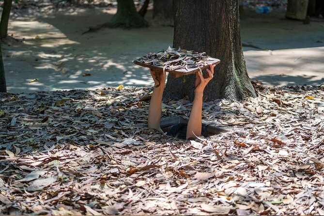 Half-Day Cu Chi Tunnels Guided Exclusive Experience with Pick Up - Entering the tunnel, or viewing it from above