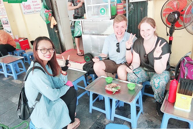 Half-Day Guided Hanoi Motorcycle Tour with Hotel Pickup - Long Bien Bridge, ceramic streets, and a wet market