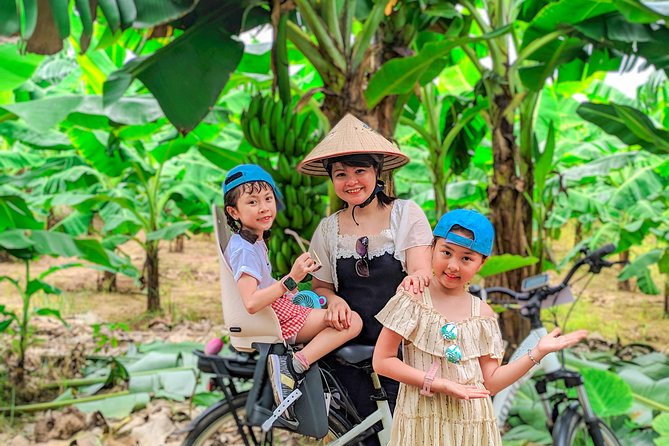 Half Day Ha Noi Tour by E-bike - Thanh Ha Market brings the ride down to street level