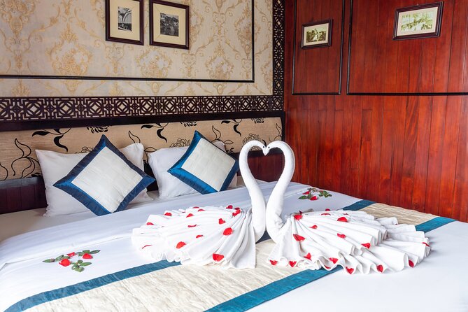 Halong Bay 2 Days 1 Night Traditional Boat - Ti Top Island combines a beach break and a steep view
