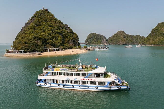 Halong bay 4 hours boat tour from Halong city with 2 caves, kayak - Dinh Huong and Hon Ga Choi from the deck