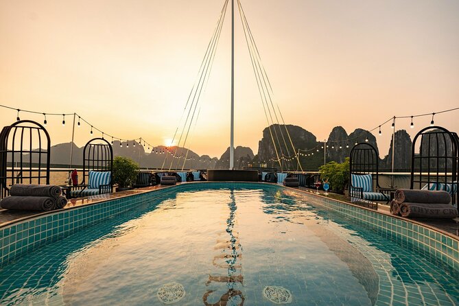 Halong Bay Day Tour With Sunlight Luxury Cruise With Transfer - Kayaking or a bamboo boat at Hang Luon