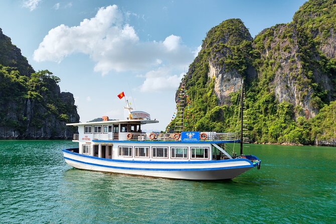 Halong Bay Day Tour With Titop Island, Cave, Kayak & Lunch - Lunch among Halong Bay’s limestone towers