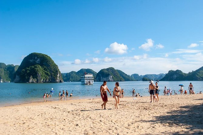 Halong Bay Day Tour With Titop Island, Cave, Kayak & Lunch - Kayaking or bamboo boating at Luon Cave