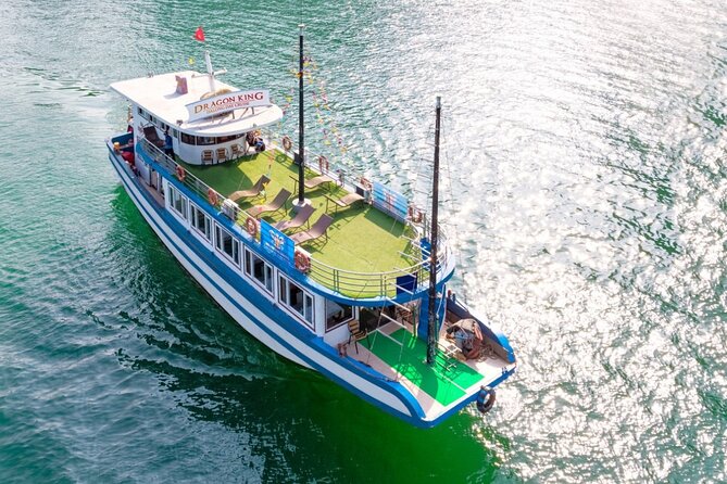 Halong Bay Day Tour With Titop Island, Cave, Kayak & Lunch - Sunset, fruit, and the ride back to Hanoi