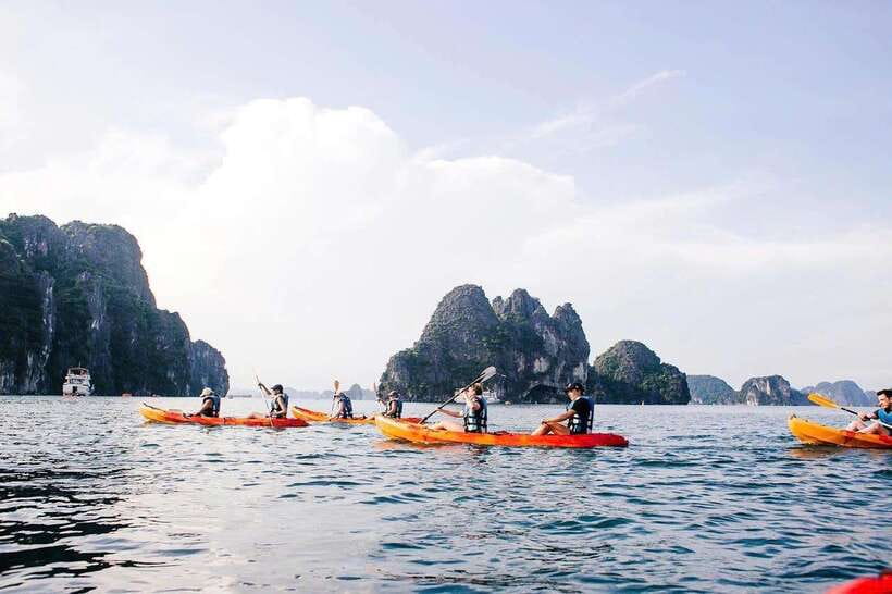 Halong Bay Luxury Cruise: Kayak&Swim,Cave, Party BEST SELLER - Titov Island, beach time, and the summit walk
