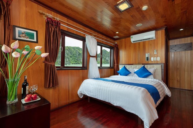 Halong deluxe cruise 2D/1N: Surprise cave, Titop island, Full Meals, best prices - Titop Island for views and a swim