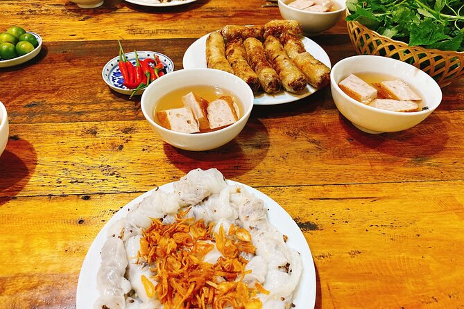 Hanoi: 7 Tasting Street Food Walking Tour and Train Street - Walking through Hanoi and Hoan Kiem