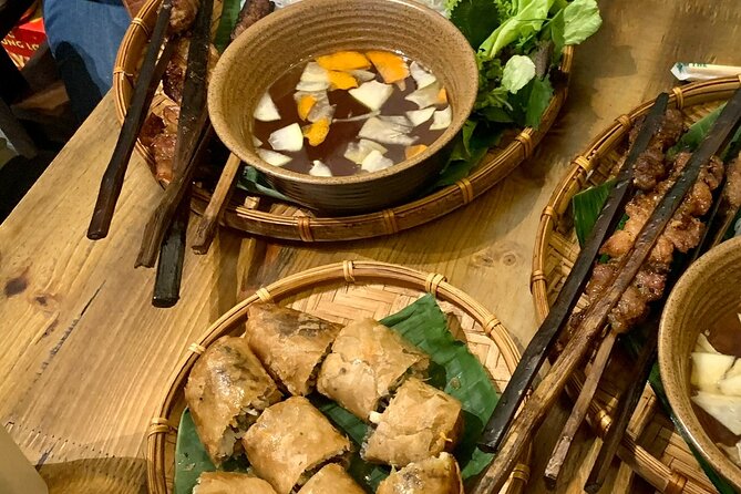 Hanoi After Dark Vespa Tour (4 hours): Street Food & Night Vibes - Truc Bach turns the ride into a proper food crawl