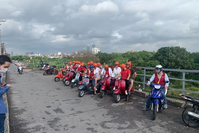 Hanoi Back Streets Vespa Tours: Hanoi Insider Vintage Vespa Tour - The Reunification railway through Hanoi homes