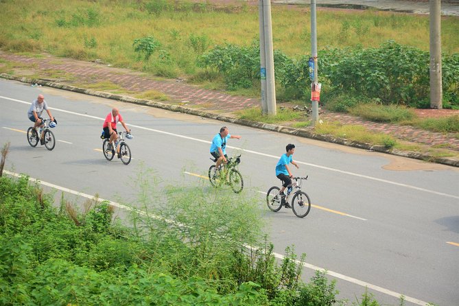 Hanoi Bicycle Tours: Half Day Bicycle Tours Hanoi Countryside - Crossing Long Bien Bridge above the Red River