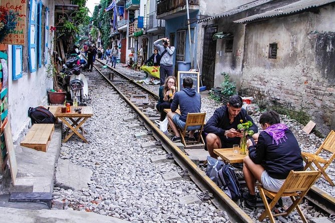 Hanoi City Half Day Private Tour: Hidden Corners & Train Street - Dong Xuan Market brings the city back to street level