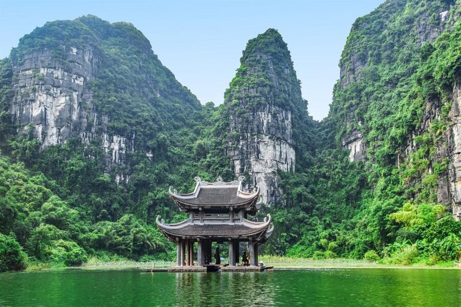 Hanoi: Guided Full-Day Hoa Lu, Trang An and Mua Cave Tour - Cycling through a local village